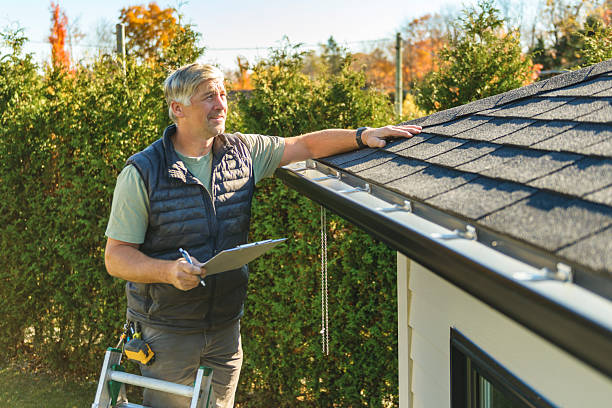 Professional Hail Damage Roof Repair technician working in Sheldonville, MA